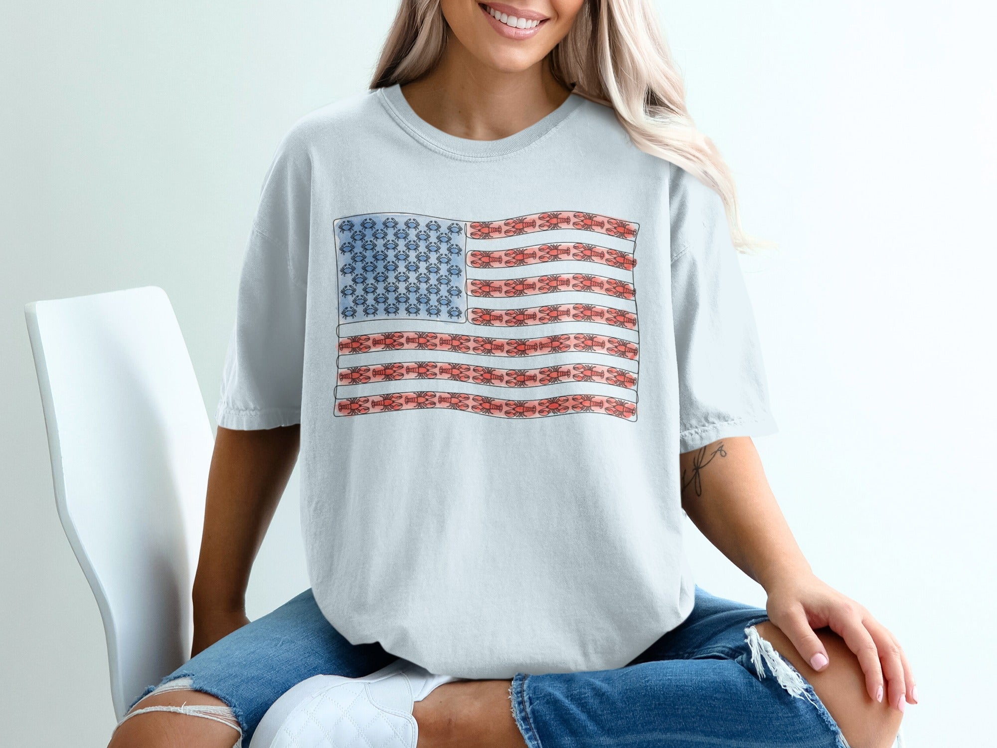 T-shirt with an American flag design made of small repeating patterns.