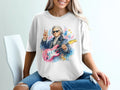 Beethoven in sunglasses playing a pink electric guitar, white t-shirt.