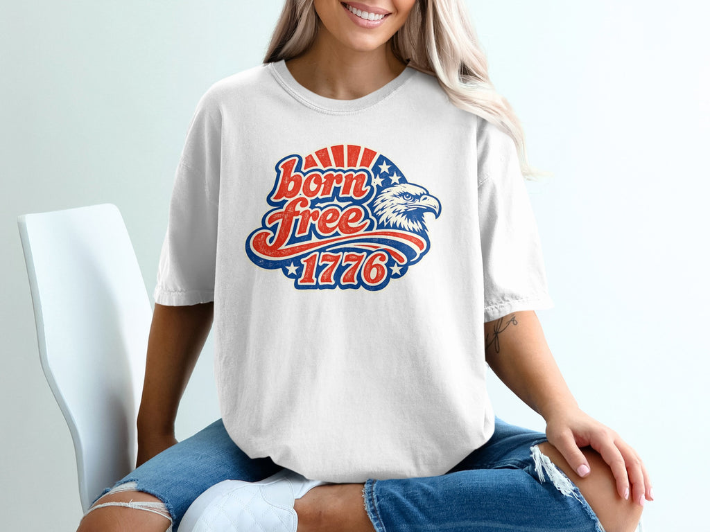 White t-shirt with "Born Free 1776" and an eagle graphic.