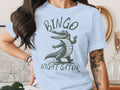 Light blue t-shirt with a cartoon alligator and the text "BINGO NIGHT GATOR".