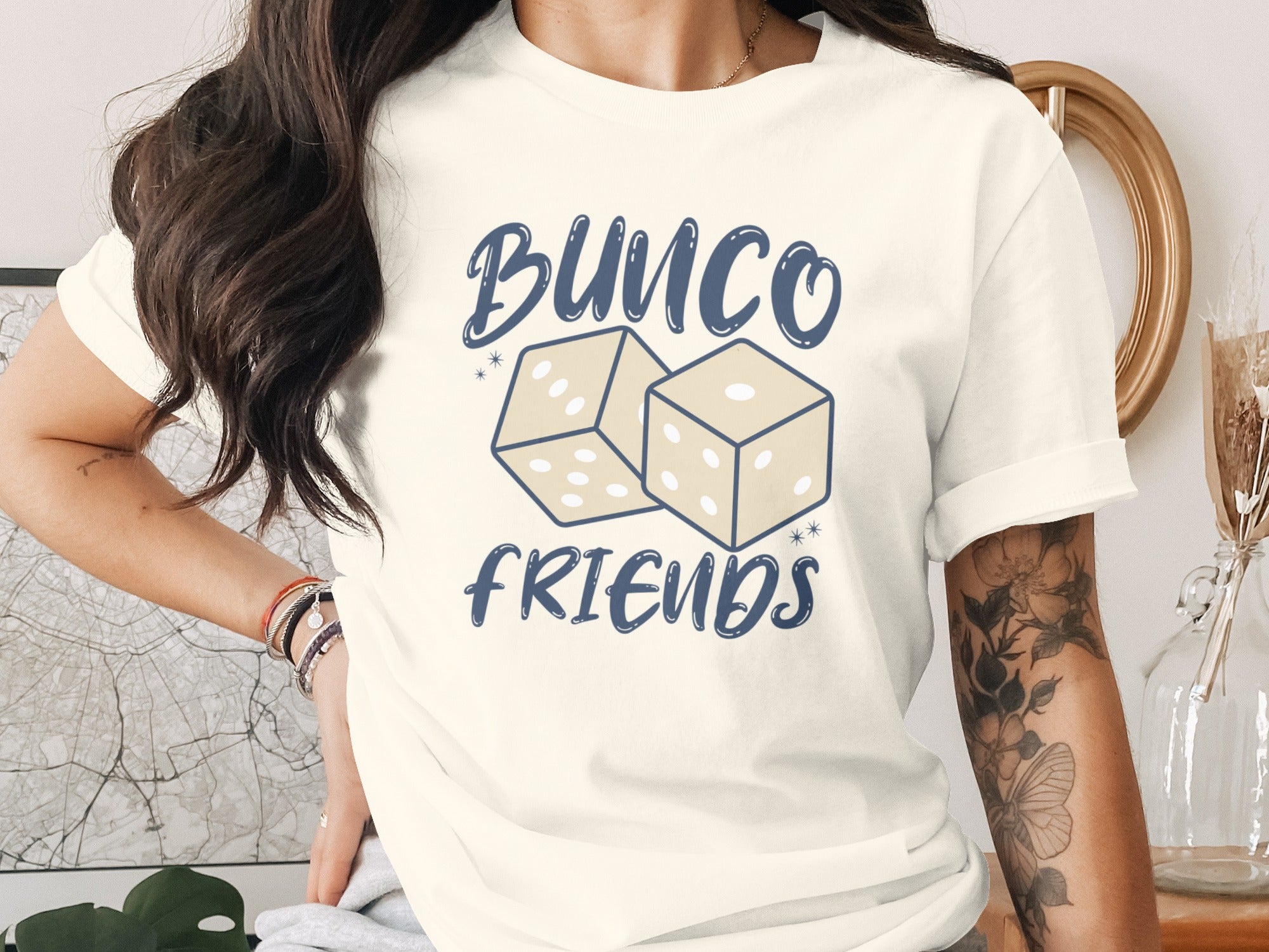 Cream t-shirt with "Bunco Friends" text and two dice graphic.