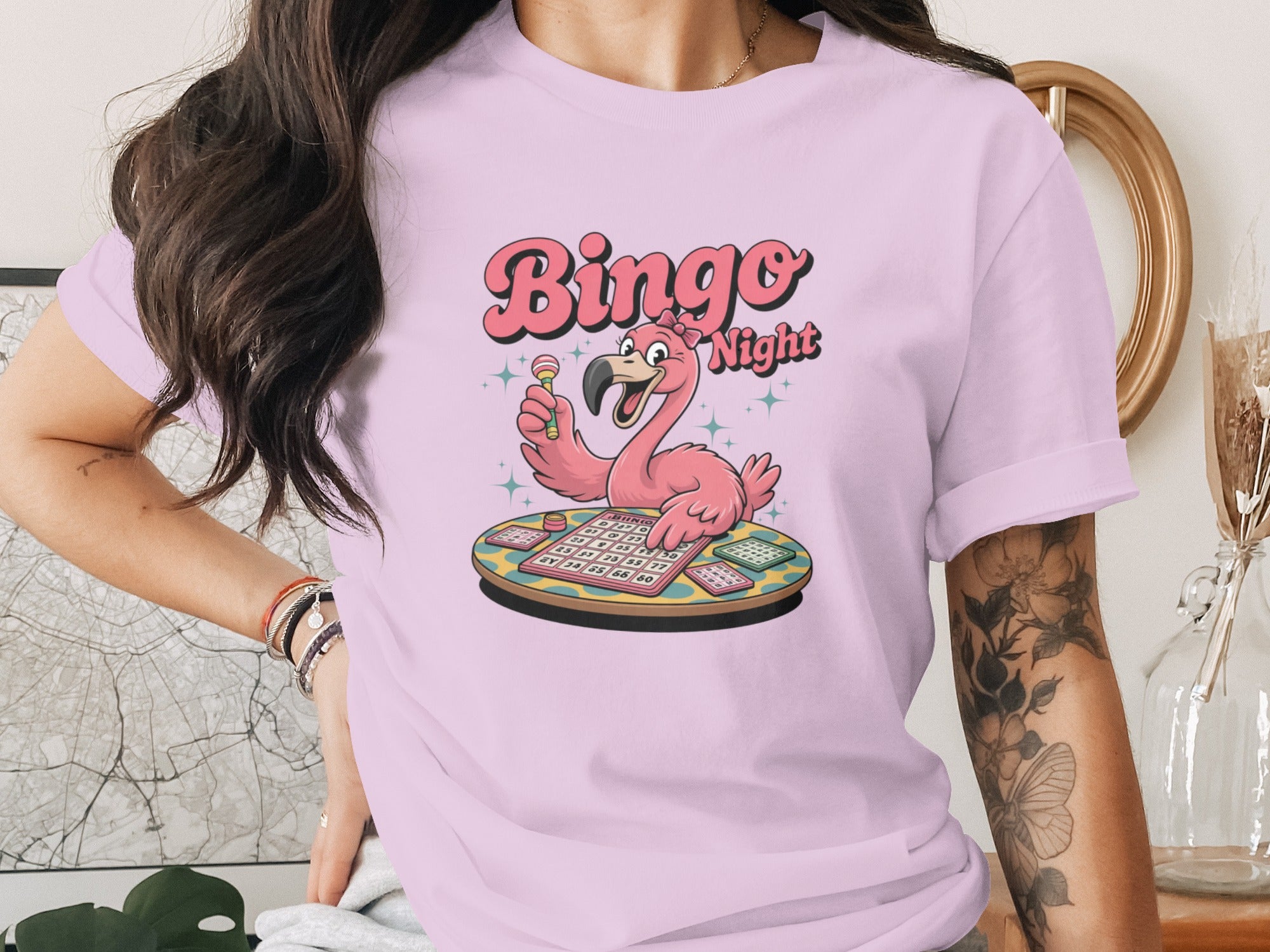 Pink flamingo playing bingo with "Bingo Night" text.