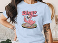 Light blue t-shirt featuring a cartoon flamingo and "Bingo Night" text.