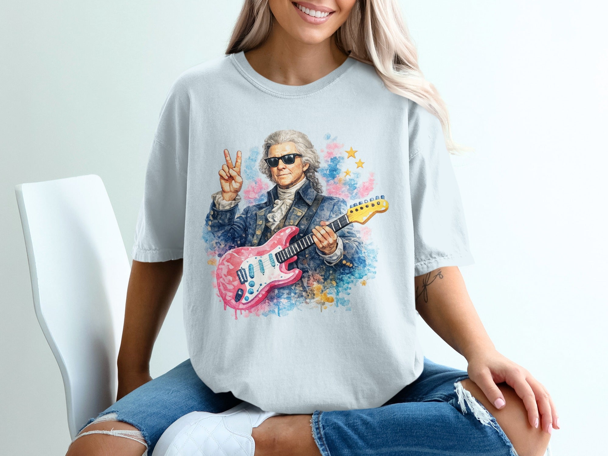 George Washington in sunglasses playing a pink electric guitar.