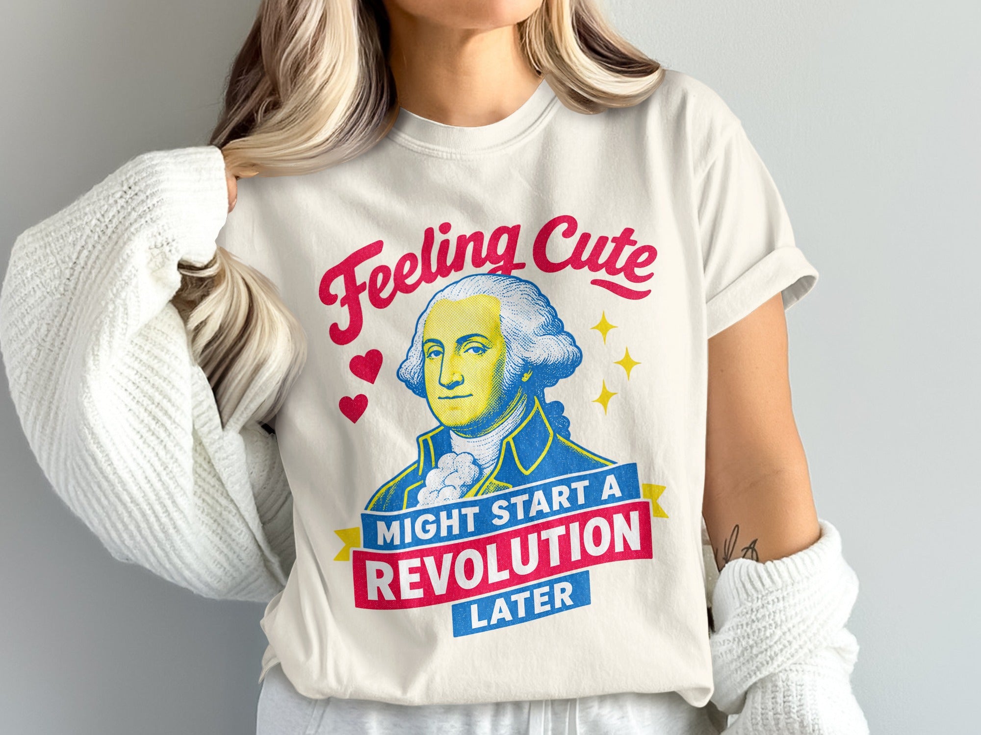 T-shirt with George Washington graphic and "Feeling Cute Might Start a Revolution Later" text.