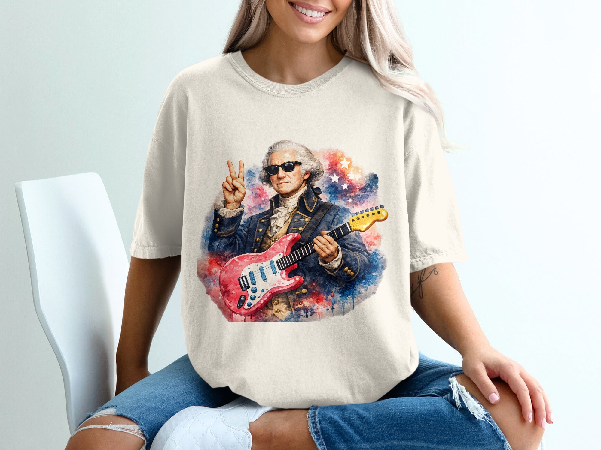 George Washington in sunglasses and a suit plays a red electric guitar.