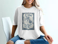White t-shirt with Statue of Liberty and "USA God Shed His Grace on Thee" text.