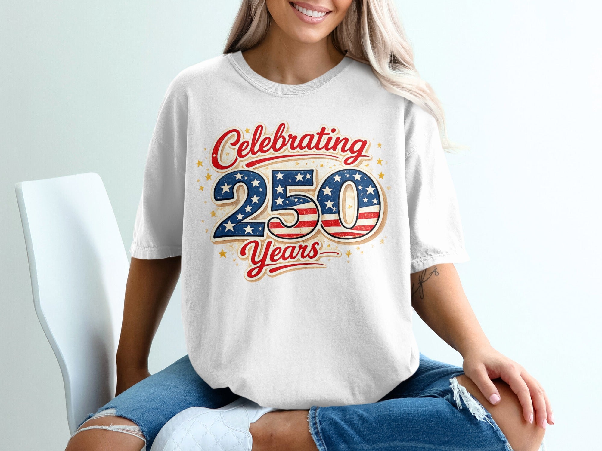 White t-shirt with "Celebrating 250 Years" text and American flag stars.