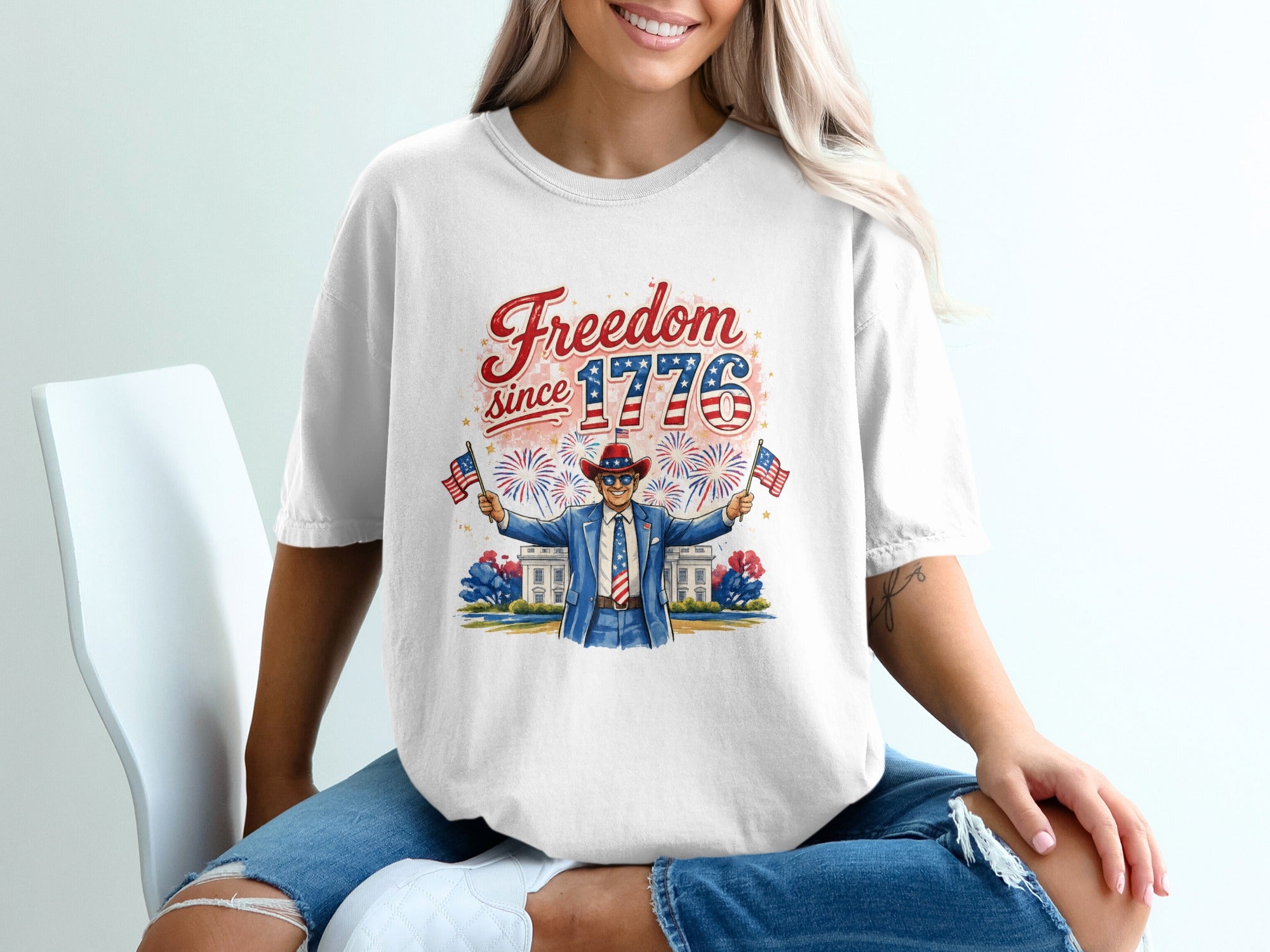 Man in cowboy hat holding American flags, "Freedom since 1776" text.