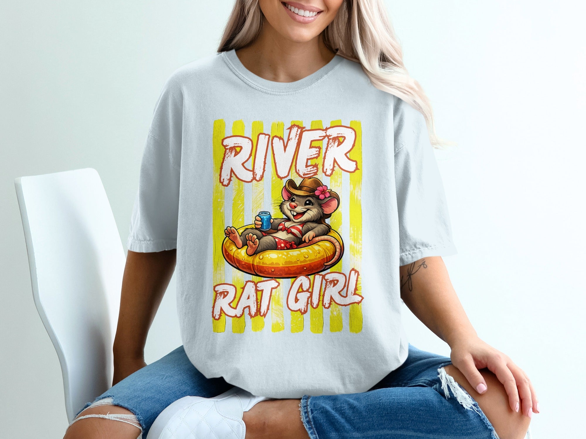 T-shirt graphic with text "River Rat Girl" and a mouse on an inner tube.