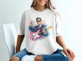 Watercolor illustration of a man in a suit with sunglasses holding a pink electric guitar.
