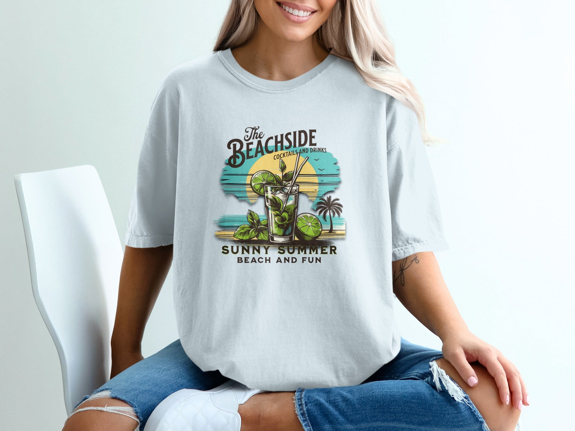 T-shirt graphic: "The Beachside Cocktails and Drinks," a mojito, palm tree, and sunset.