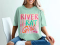 Mint green t-shirt with "River Rat Girl" text and summer icons.