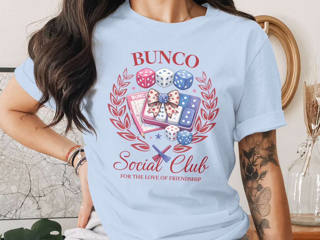 Bunco Social Club t-shirt graphic with dice, score card, and playful text.